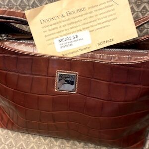 Dooney & Bourke top zip shoulder bag. Brand new; not used. Warm brown